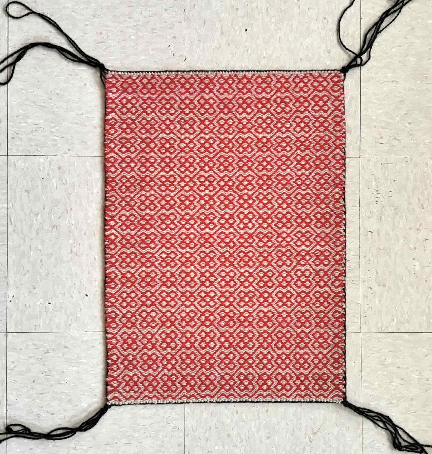 A saddle blanket handmade by Nikyle Begay.